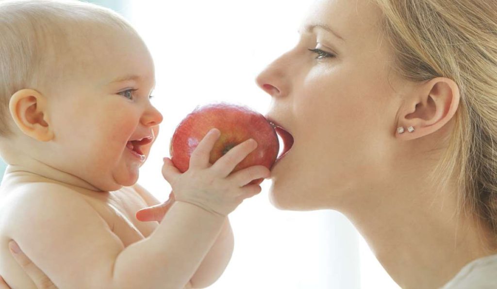 mother-and-baby-eating-apple